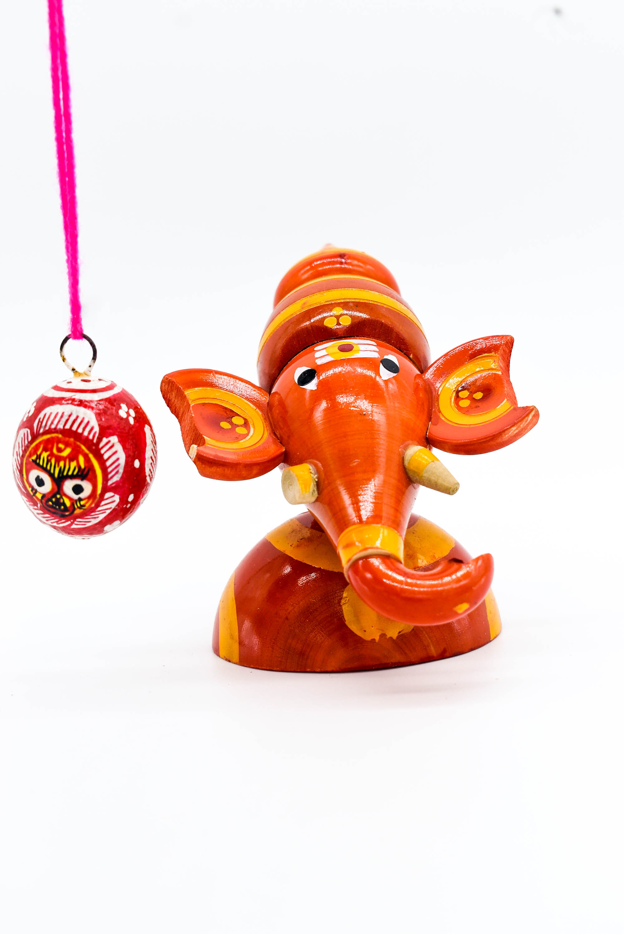 Handcrafted Indian Car Dashboard Ganesh Figurine with Jagannath Hanging Ornament on Beetle nut, multicolored Handcrafted Indian Car Dashboard Ganesh Figurine with Jagannath Hanging Ornament on Beetle nut, multicolored