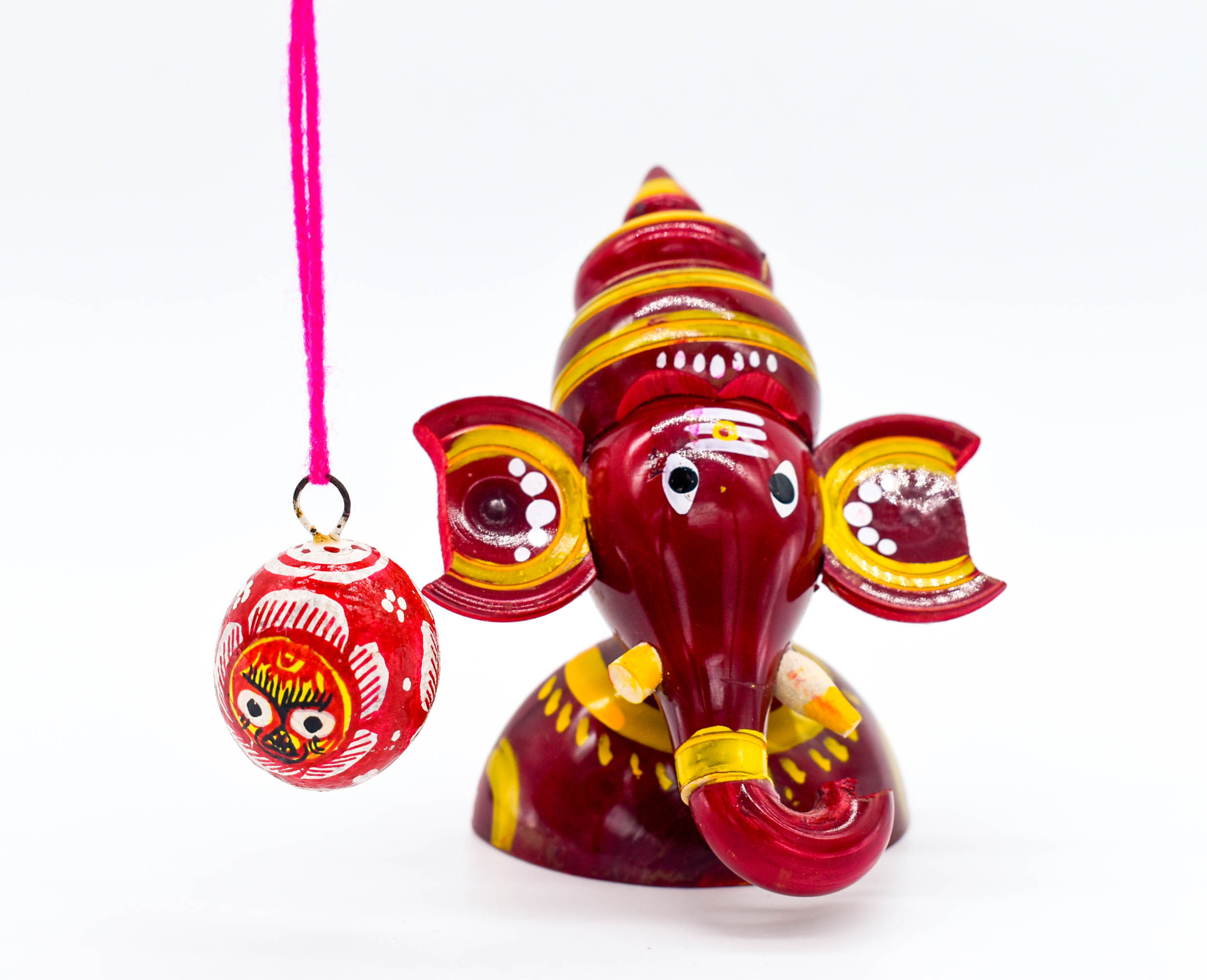 Handcrafted Indian Car Dashboard Ganesh Figurine with Jagannath Hanging Ornament on Beetle nut, multicolored Handcrafted Indian Car Dashboard Ganesh Figurine with Jagannath Hanging Ornament on Beetle nut, multicolored