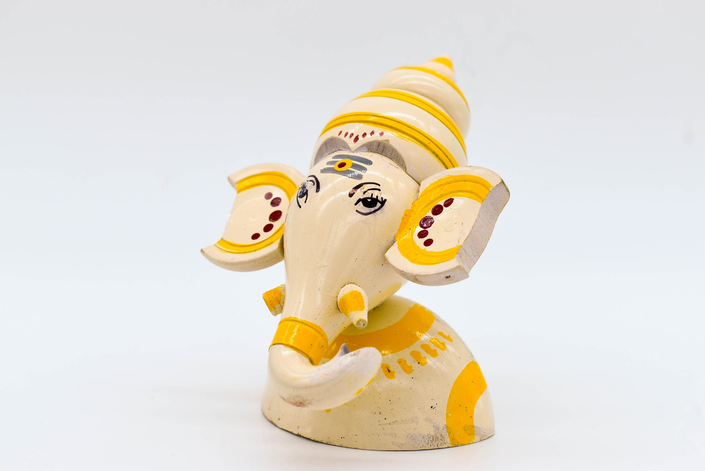 Handcrafted Indian Car Dashboard Ganesh Figurine with Jagannath Hanging Ornament on Beetle nut, multicolored Handcrafted Indian Car Dashboard Ganesh Figurine with Jagannath Hanging Ornament on Beetle nut, multicolored