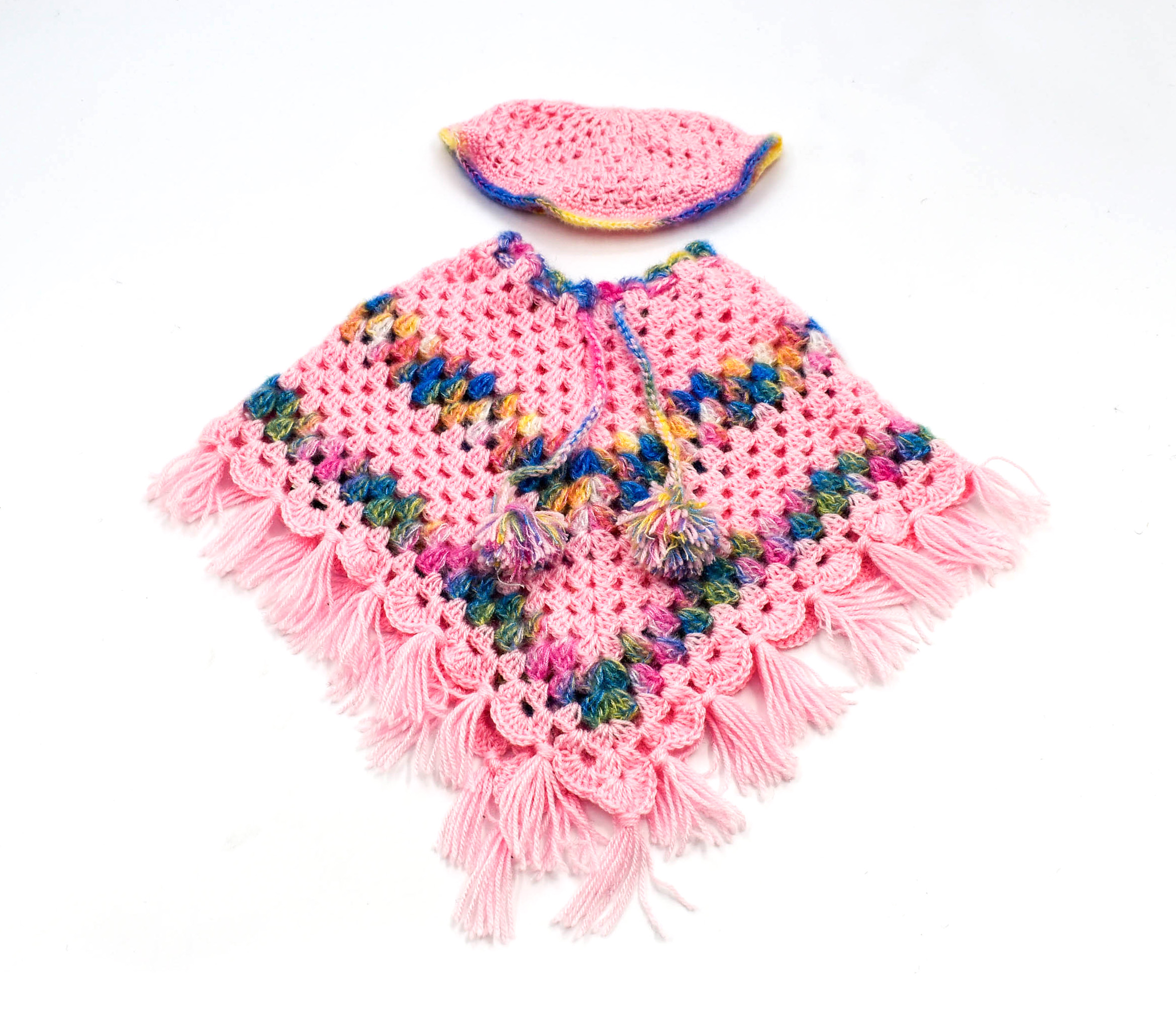 Handknitted Woolen Kids Poncho and Cap Set, Pink with Multicolor Pattern (6 Month - 1 Year) Handknitted Woolen Kids Poncho and Cap Set, Pink with Multicolor Pattern (6 Month - 1 Year)