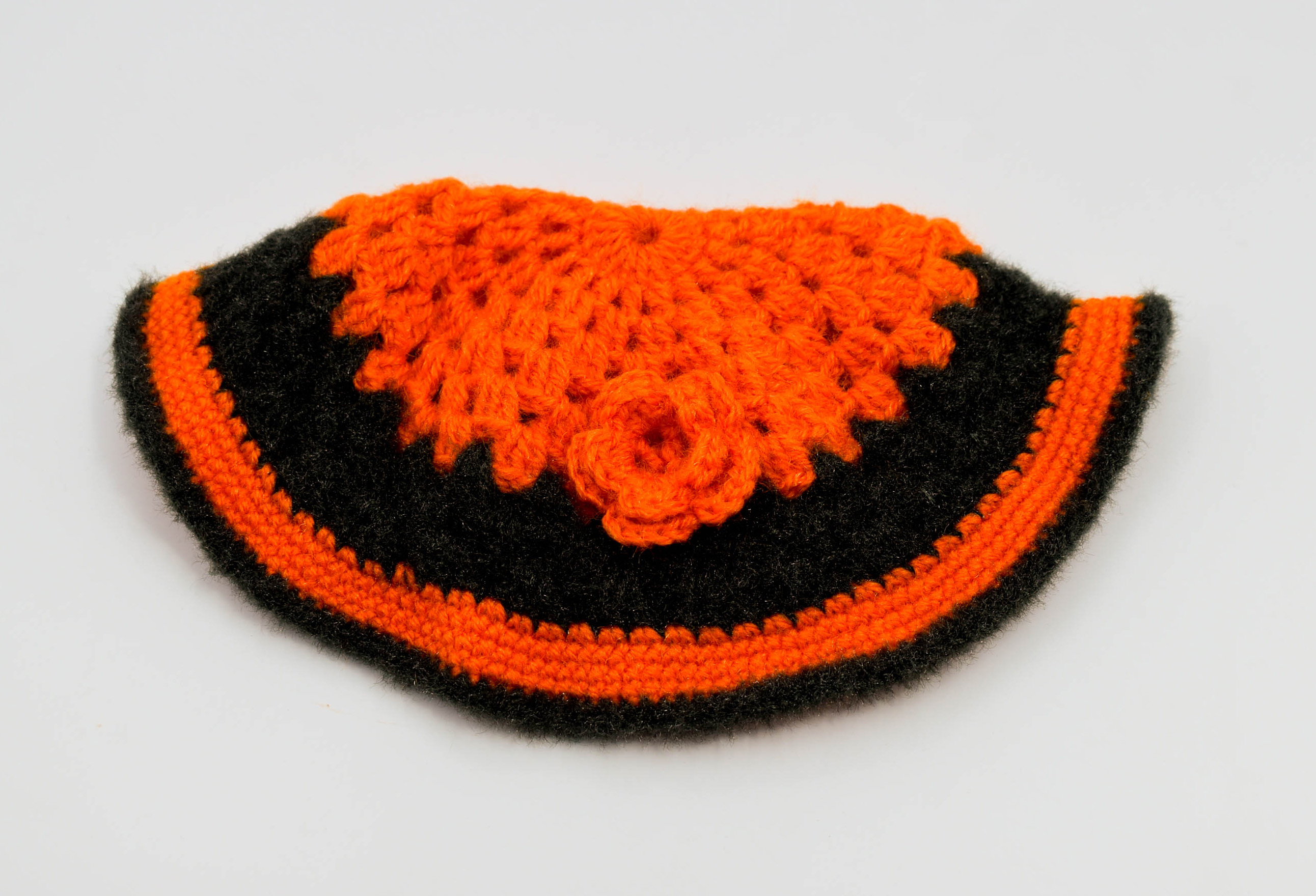 Handknitted Woolen Kids Poncho and Cap Set, Orange and Black (6 Months - 1 Year) Handknitted Woolen Kids Poncho and Cap Set, Orange and Black (6 Months - 1 Year)