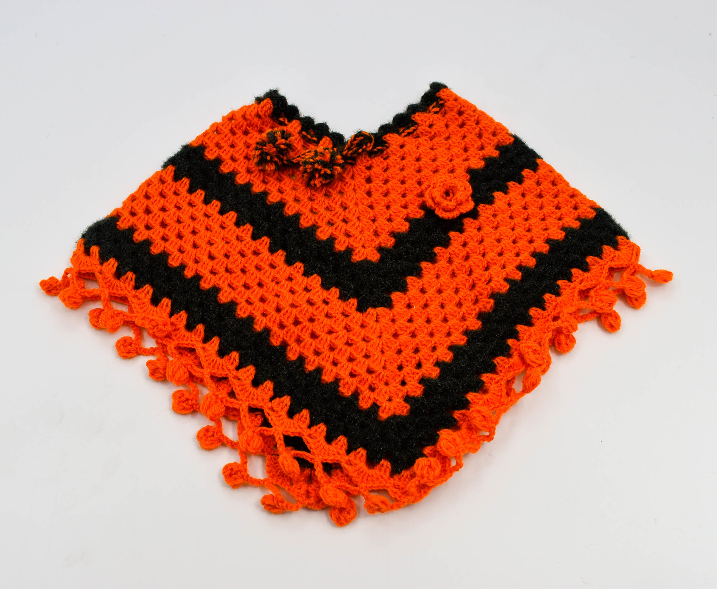 Handknitted Woolen Kids Poncho and Cap Set, Orange and Black (6 Months - 1 Year) Handknitted Woolen Kids Poncho and Cap Set, Orange and Black (6 Months - 1 Year)