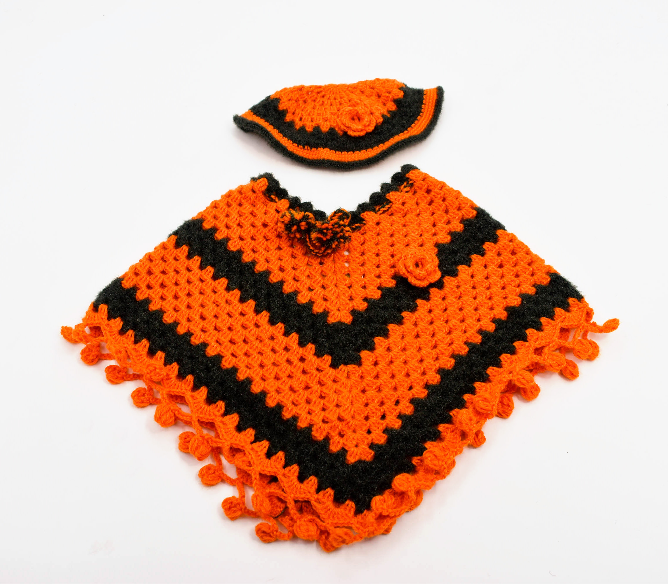 Handknitted Woolen Kids Poncho and Cap Set, Orange and Black (6 Months - 1 Year) Handknitted Woolen Kids Poncho and Cap Set, Orange and Black (6 Months - 1 Year)
