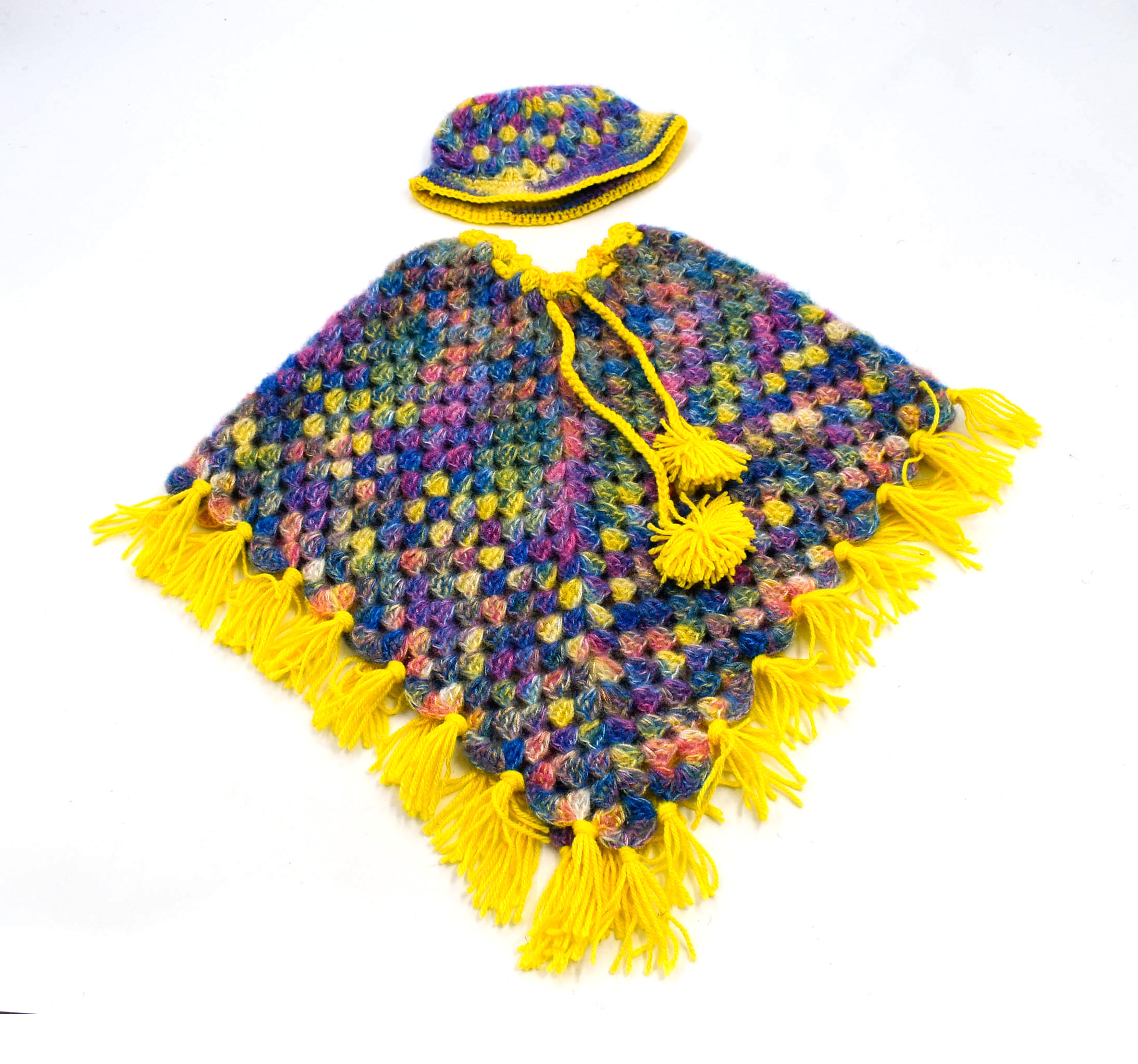 Handknitted Kids Multicolor Woolen Poncho and Cap Set with Yellow Tassels (1-3 Years) Handknitted Kids Multicolor Woolen Poncho and Cap Set with Yellow Tassels (1-3 Years)