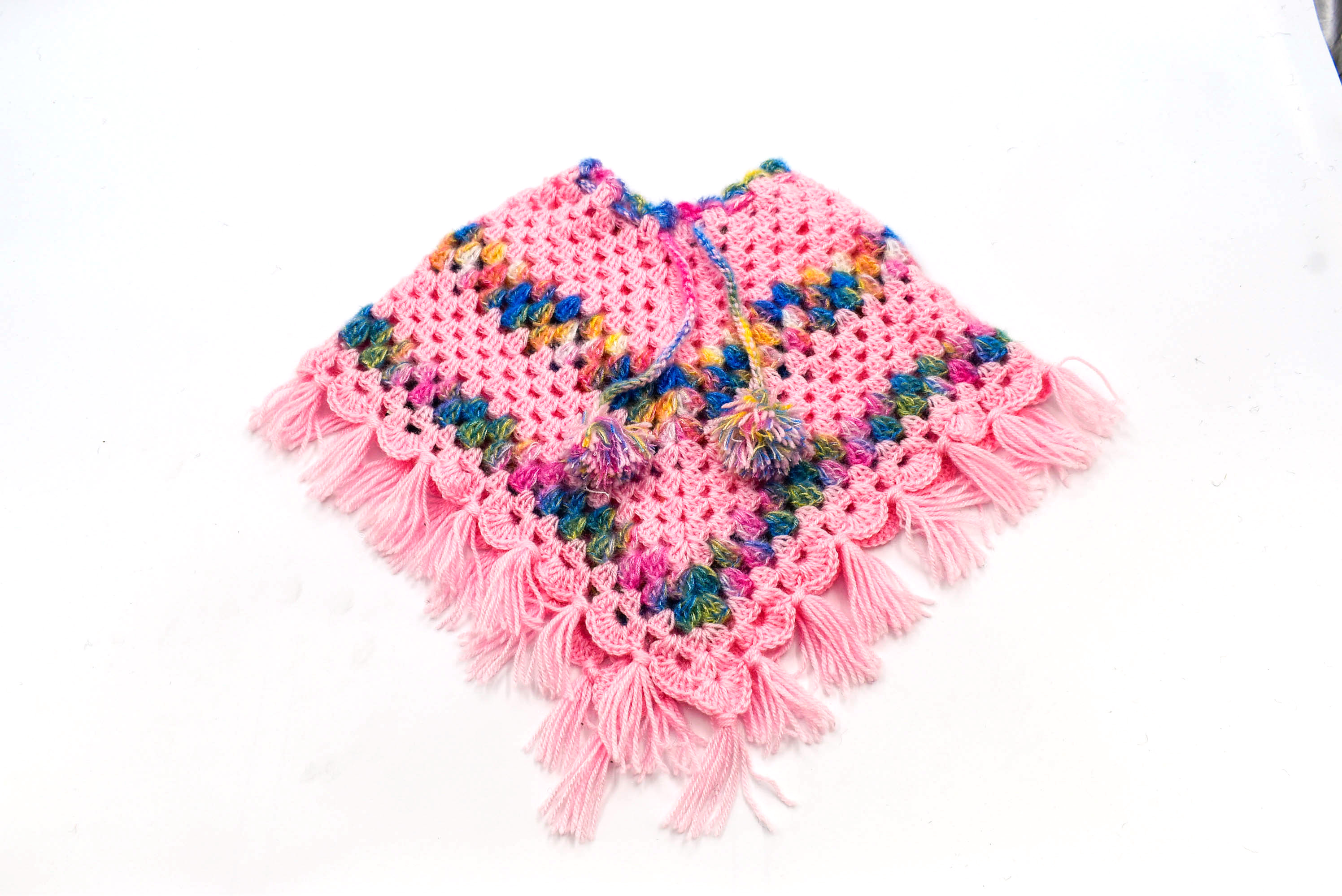 Handknitted Woolen Kids Poncho and Cap Set, Pink with Multicolor Pattern (6 Month - 1 Year) Handknitted Woolen Kids Poncho and Cap Set, Pink with Multicolor Pattern (6 Month - 1 Year)