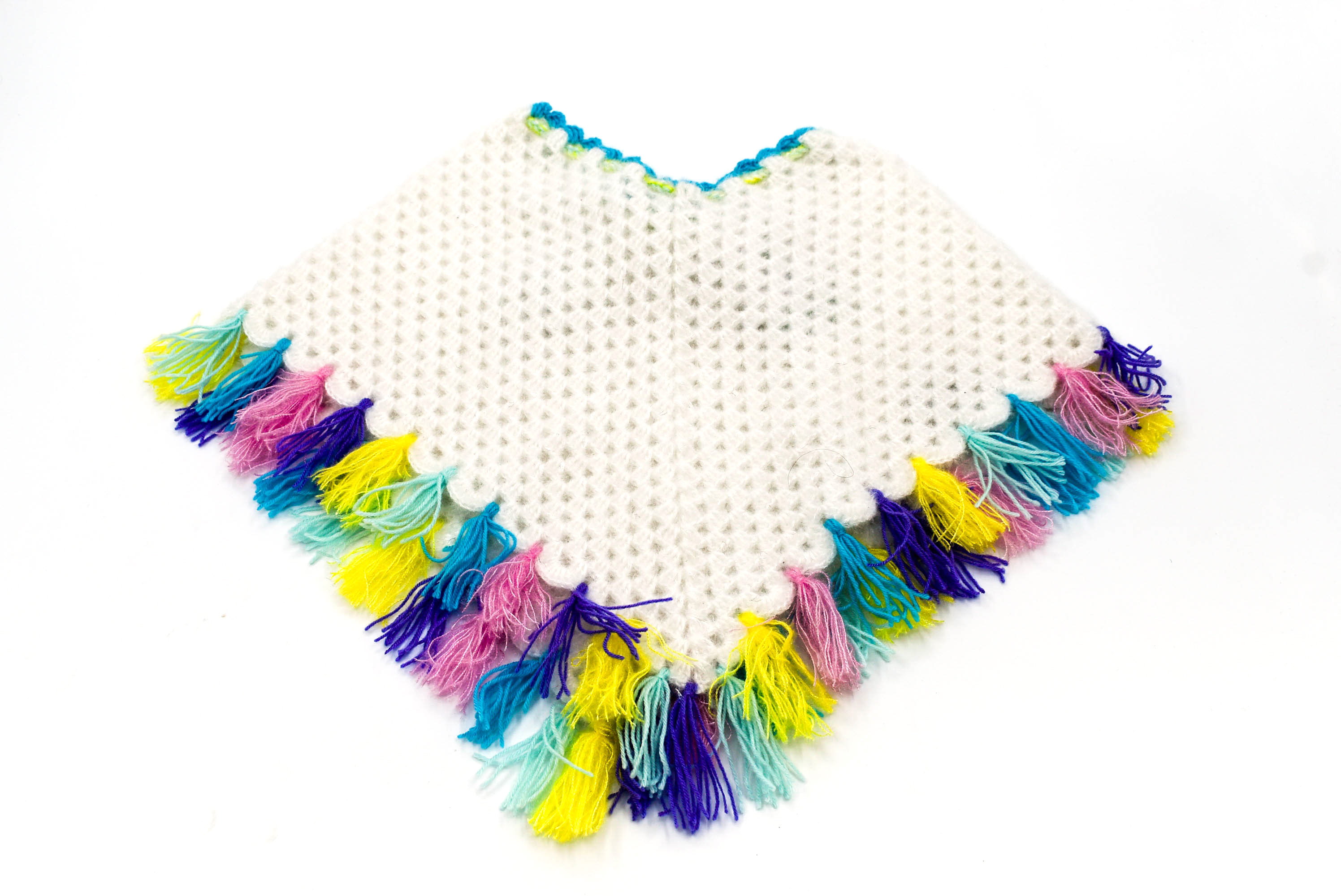 Handknitted Kids Woolen Poncho and Cap Set, White with Multicolor Tassels (1-3 Years) Handknitted Kids Woolen Poncho and Cap Set, White with Multicolor Tassels (1-3 Years)