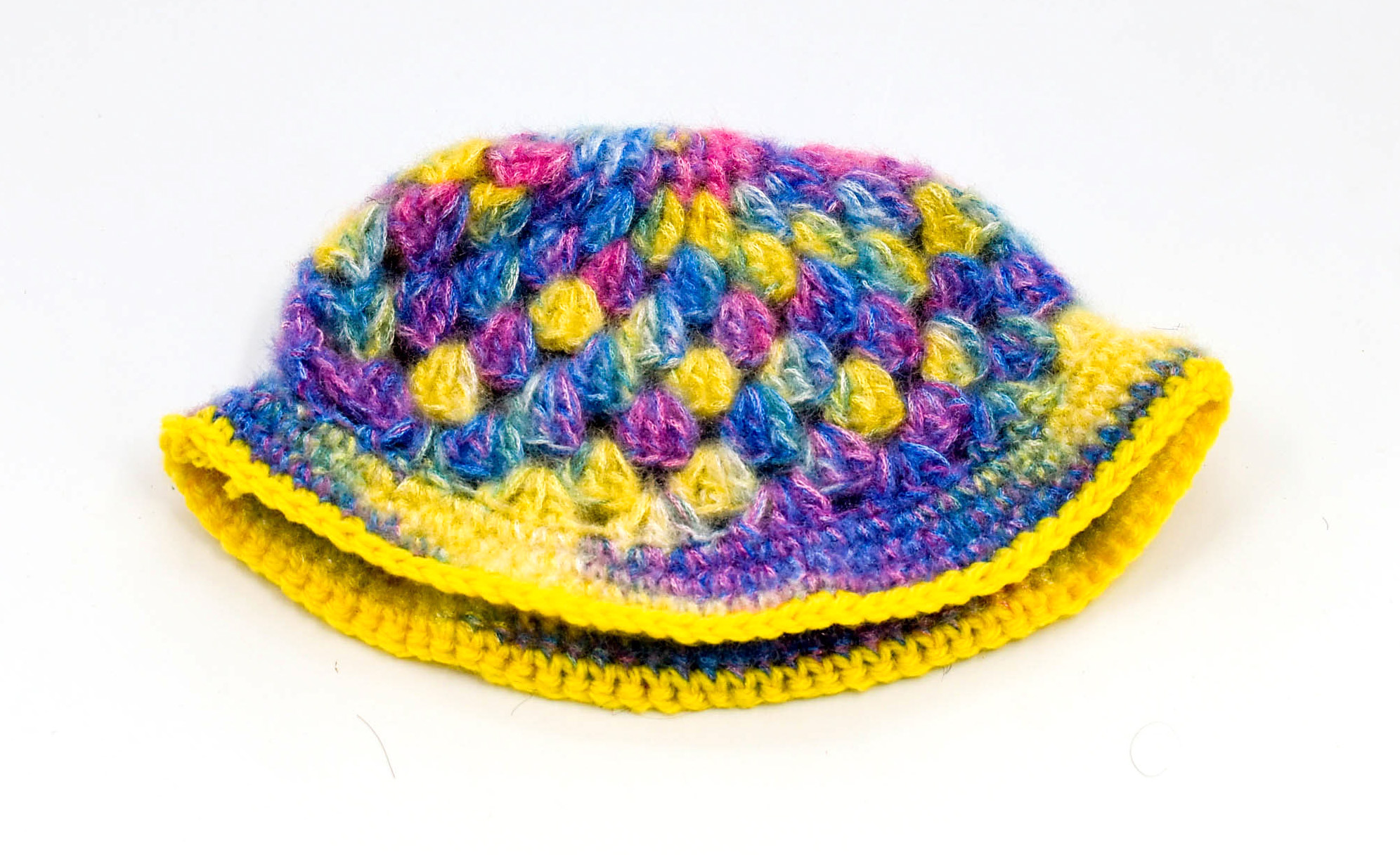 Handknitted Kids Multicolor Woolen Poncho and Cap Set with Yellow Tassels (1-3 Years) Handknitted Kids Multicolor Woolen Poncho and Cap Set with Yellow Tassels (1-3 Years)