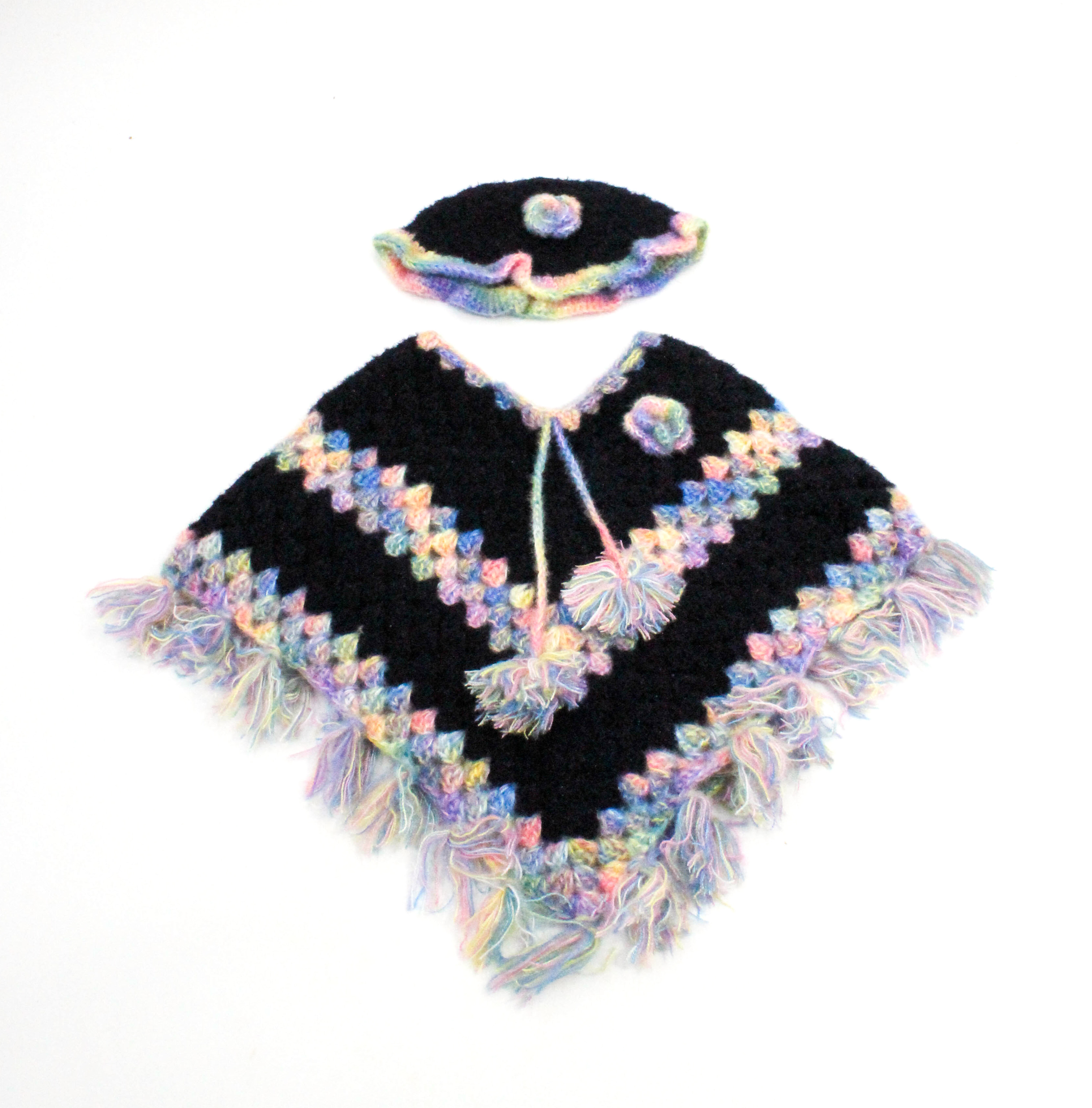 Handknitted Kids Woolen Poncho and Cap Set, Black with Rainbow Trim (6 months - 1 Year) Handknitted Kids Woolen Poncho and Cap Set, Black with Rainbow Trim (6 months - 1 Year)