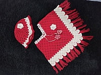 Handknitted Red and white woolen poncho and cap for kids between 3 and 4 years Handknitted Red and white woolen poncho and cap for kids between 3 and 4 years