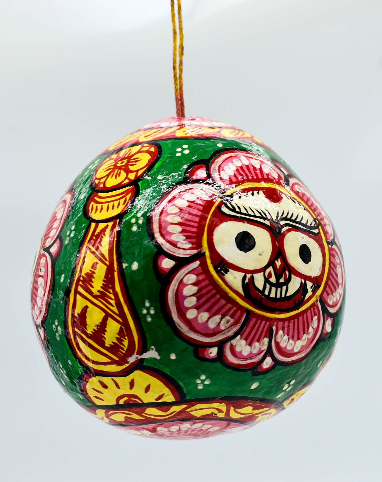 Handpainted Pattachitra Art of Lord Jagannath on Coconut Shell with hanging provision Handpainted Pattachitra Art of Lord Jagannath on Coconut Shell with hanging provision